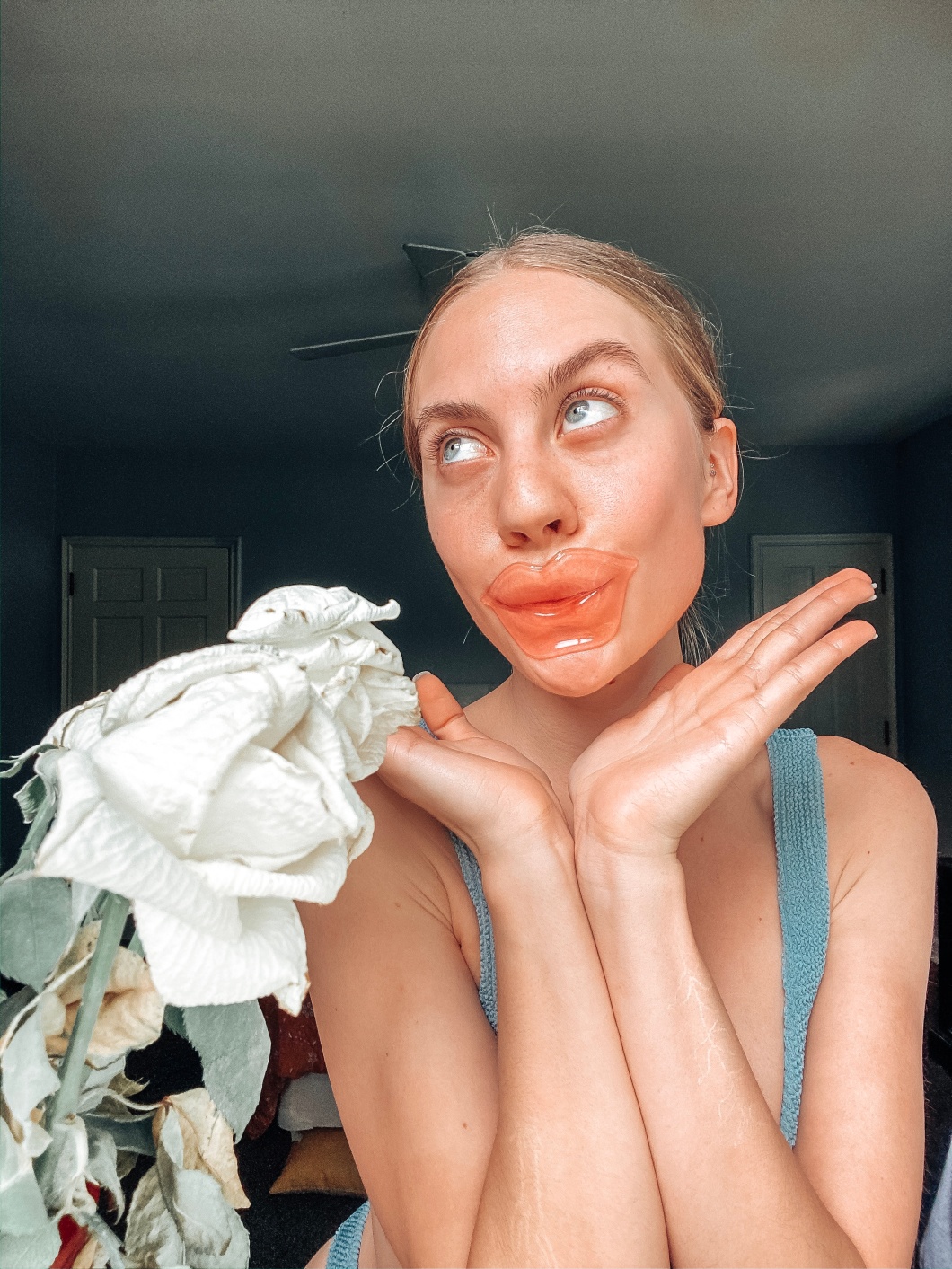 Image of Candace with a jelly lip mask from KNC Beauty.